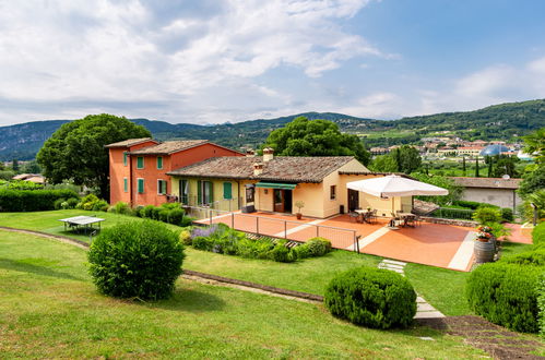 Foto 47 - Apartamento de 2 habitaciones en Garda con piscina y vistas a la montaña