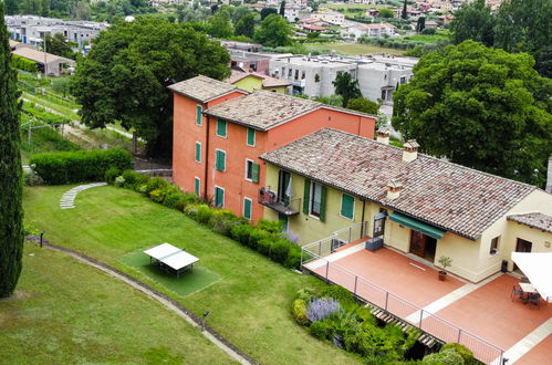 Foto 43 - Apartamento de 2 habitaciones en Garda con piscina y vistas a la montaña