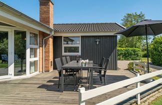 Photo 2 - Maison de 4 chambres à Vejlby Fed avec terrasse et sauna