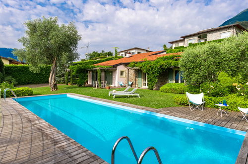 Foto 1 - Casa de 2 quartos em Griante com piscina privada e vista para a montanha