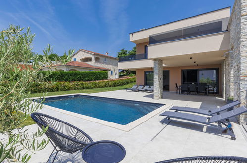 Photo 17 - Maison de 4 chambres à Kaštelir-Labinci avec piscine privée et vues à la mer