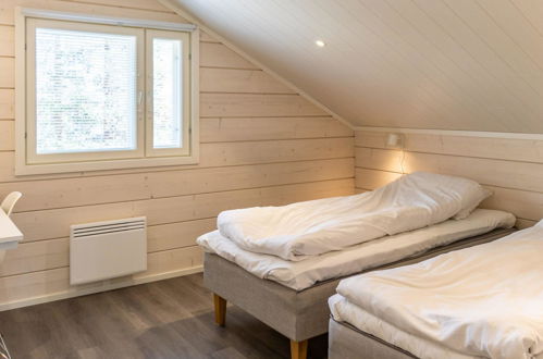 Foto 34 - Casa de 5 habitaciones en Pelkosenniemi con sauna y vistas a la montaña