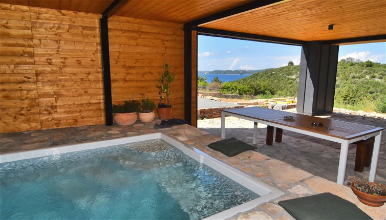 Photo 1 - Maison de 4 chambres à Sali avec piscine privée et vues à la mer