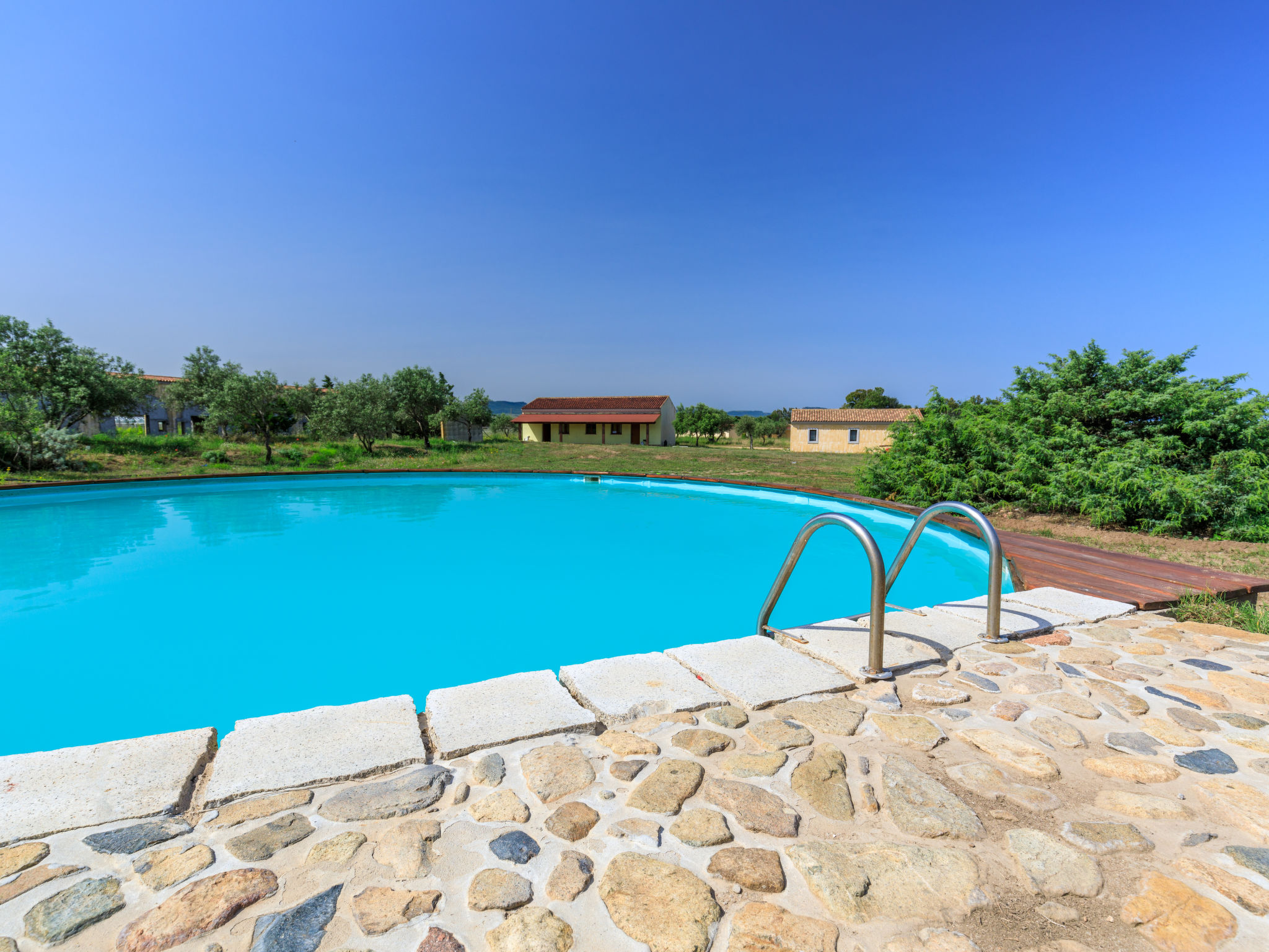 Photo 1 - Maison de 1 chambre à Badesi avec piscine et jardin