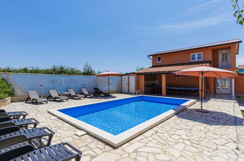Photo 23 - Maison de 6 chambres à Pula avec piscine privée et jardin