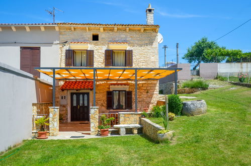 Photo 8 - Maison de 2 chambres à Ližnjan avec piscine privée et vues à la mer