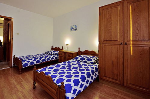 Foto 13 - Appartamento con 2 camere da letto a Tisno con terrazza e vista mare