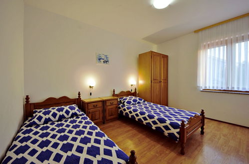 Foto 7 - Appartamento con 2 camere da letto a Tisno con terrazza e vista mare