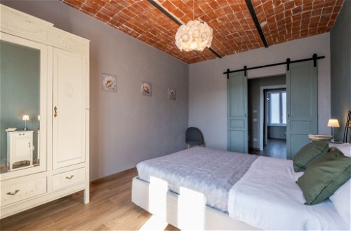 Foto 15 - Apartment mit 1 Schlafzimmer in Calosso mit schwimmbad und garten