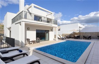 Foto 2 - Casa de 4 habitaciones en Albufeira con piscina privada y vistas al mar