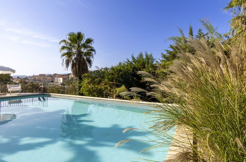 Photo 5 - Appartement de 2 chambres à Imperia avec piscine et jardin