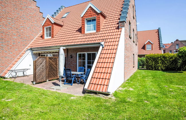 Casa de 4 quartos em Butjadingen com piscina e jardim - Foto 1