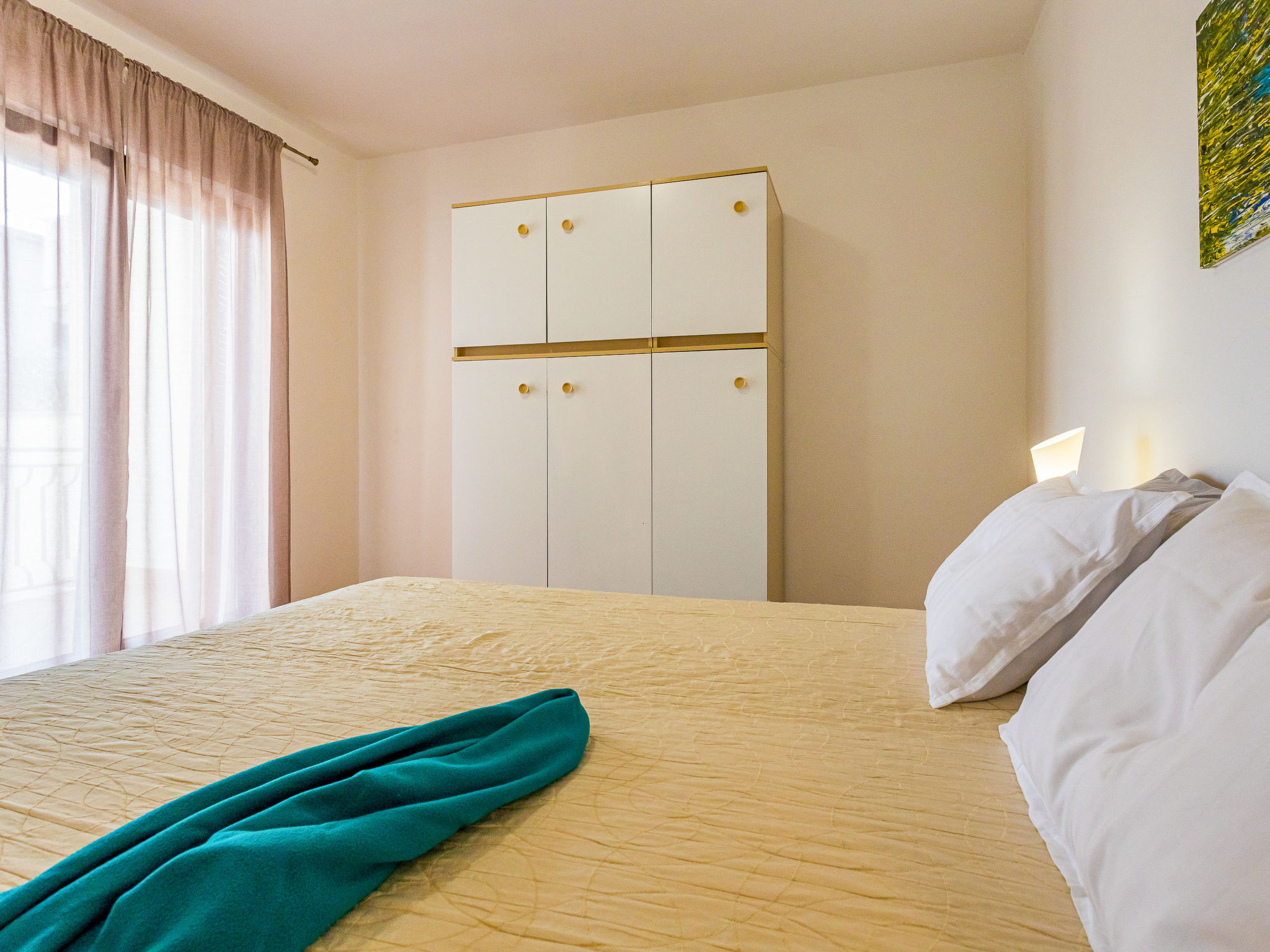 Foto 18 - Appartamento con 2 camere da letto a Umag con giardino e vista mare