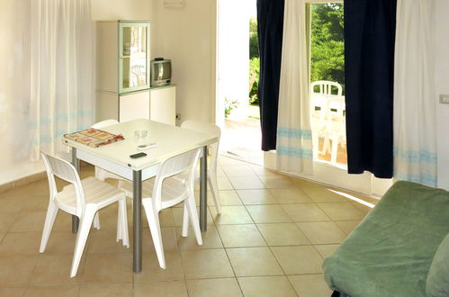 Foto 4 - Apartamento de 1 habitación en Olbia con piscina y jardín