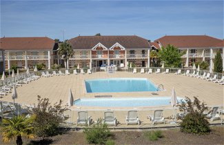 Foto 1 - Apartment mit 2 Schlafzimmern in Le Verdon-sur-Mer mit schwimmbad und terrasse