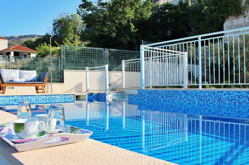 Photo 5 - Maison de 2 chambres à Podstrana avec piscine privée et vues à la mer