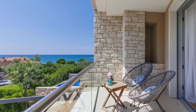 Foto 1 - Casa con 3 camere da letto a Umag con piscina privata e vista mare