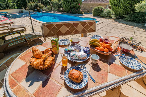 Photo 4 - Maison de 2 chambres à Blanquefort-sur-Briolance avec piscine privée et terrasse