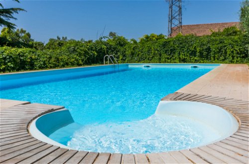 Foto 48 - Apartamento de 2 habitaciones en Montalto di Castro con piscina y jardín