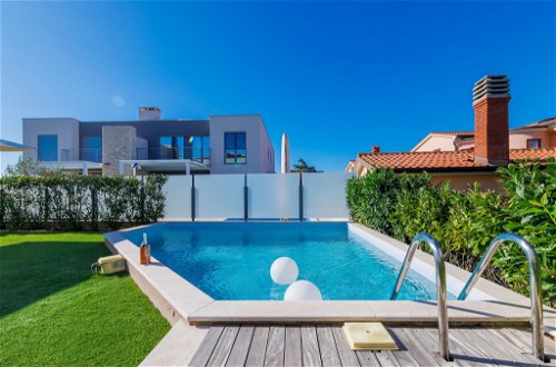 Foto 33 - Casa de 3 quartos em Umag com piscina privada e terraço