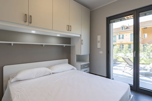 Foto 5 - Appartamento con 2 camere da letto a Imperia con piscina e giardino