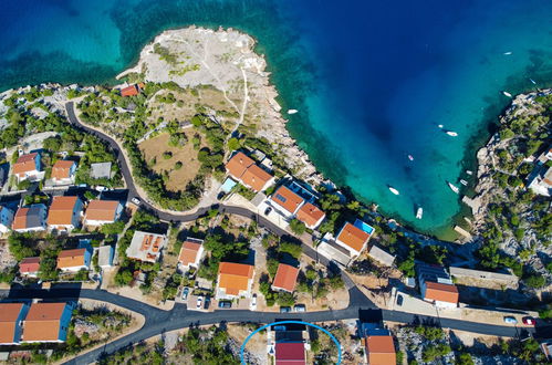 Photo 2 - Maison de 4 chambres à Senj avec piscine privée et vues à la mer