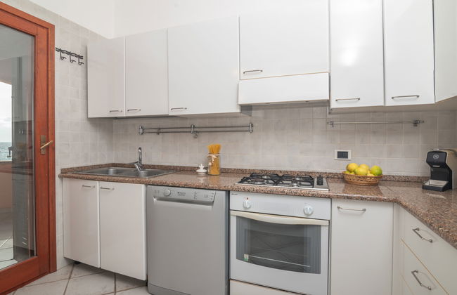 Apartamento de 2 quartos em Golfo Aranci com piscina e jardim - Foto 12