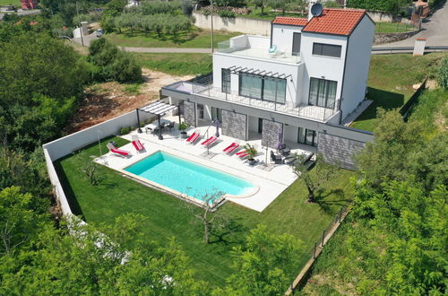 Foto 46 - Casa con 3 camere da letto a Buje con piscina privata e giardino