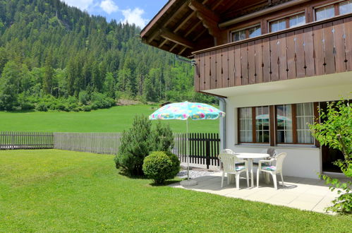 Photo 2 - Appartement de 2 chambres à Zweisimmen avec jardin et vues sur la montagne