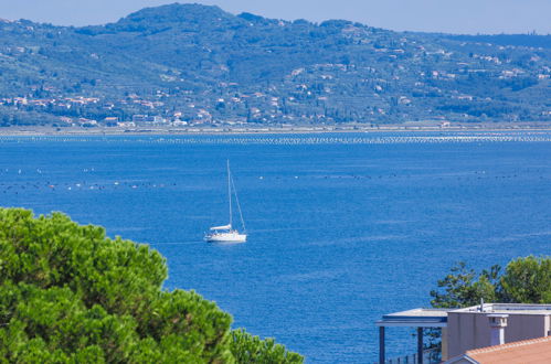 Foto 14 - Apartamento de 2 habitaciones en Umag con jardín y vistas al mar