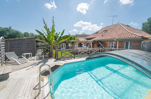 Foto 1 - Casa de 3 habitaciones en Mézos con piscina privada y vistas al mar