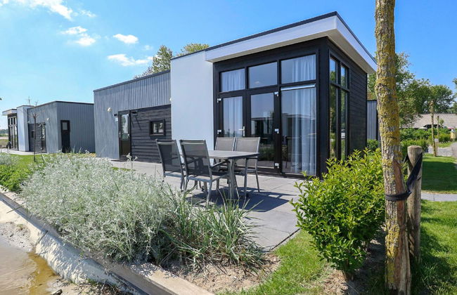 Casa de 3 quartos em Nieuwvliet com terraço - Foto 1