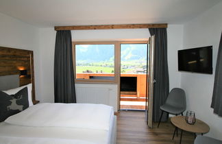 Foto 2 - Appartamento con 4 camere da letto a Ramsau im Zillertal con giardino e terrazza