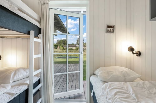 Foto 18 - Casa de 5 quartos em Grenaa com terraço e sauna