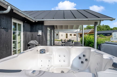 Foto 9 - Casa de 5 quartos em Grenaa com terraço e sauna
