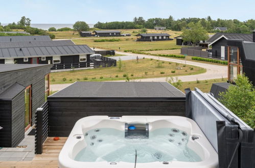 Photo 2 - Maison de 3 chambres à Glesborg avec terrasse et bain à remous