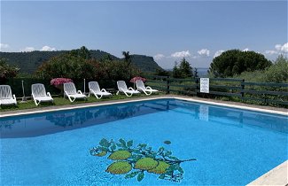 Foto 1 - Apartamento de 2 habitaciones en Costermano sul Garda con piscina y vistas a la montaña