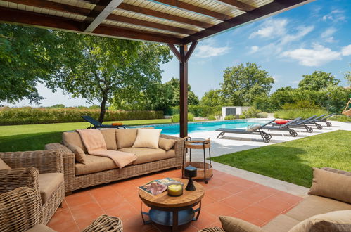 Photo 2 - Maison de 3 chambres à Tinjan avec piscine privée et terrasse