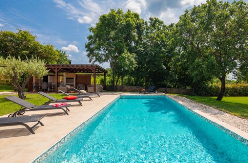 Photo 24 - Maison de 3 chambres à Tinjan avec piscine privée et terrasse
