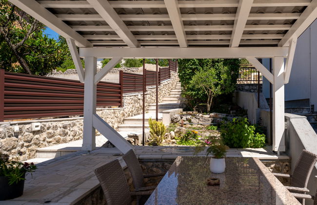 Apartamento de 4 quartos em Omišalj com piscina privada e jardim - Foto 16