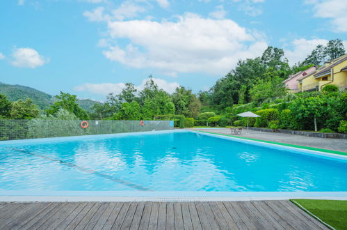 Foto 3 - Apartamento de 3 quartos em Pignone com piscina e jardim