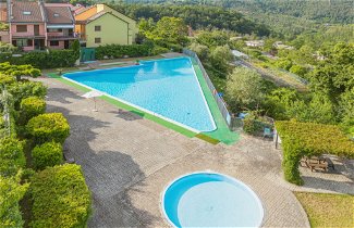 Foto 2 - Appartamento con 3 camere da letto a Pignone con piscina e giardino