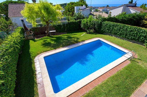 Foto 1 - Casa con 4 camere da letto a Cunit con piscina privata e giardino