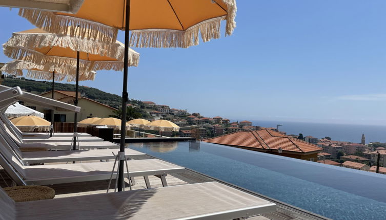Foto 1 - Apartamento de 1 quarto em Costarainera com piscina e vistas do mar