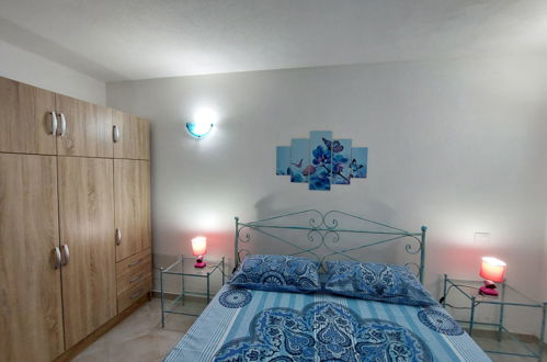 Foto 10 - Casa con 3 camere da letto a Aglientu con vista mare