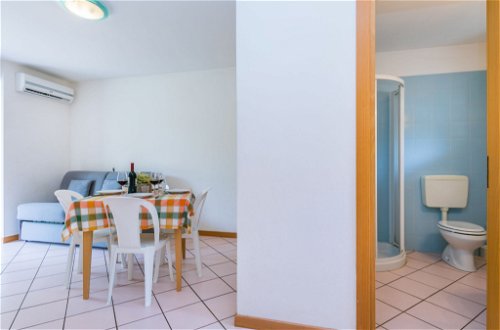 Foto 18 - Apartamento de 2 quartos em Aquileia com piscina e vistas do mar