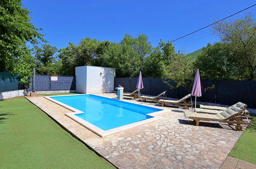 Photo 23 - Maison de 3 chambres à Prgomet avec piscine privée et vues à la mer