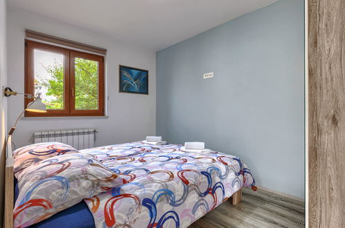 Foto 37 - Casa con 6 camere da letto a Labin con piscina privata e giardino