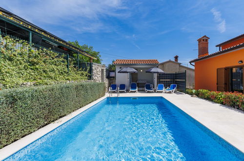 Foto 58 - Casa de 6 quartos em Labin com piscina privada e jardim