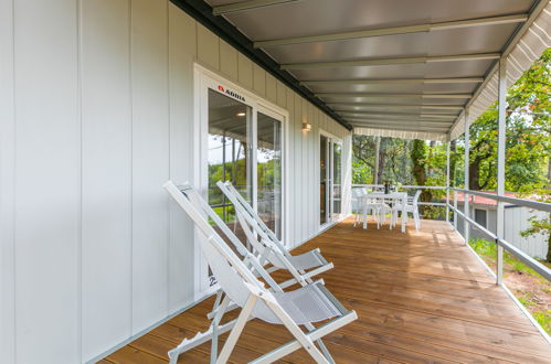 Photo 3 - Maison de 2 chambres à Aquilée avec piscine et vues à la mer